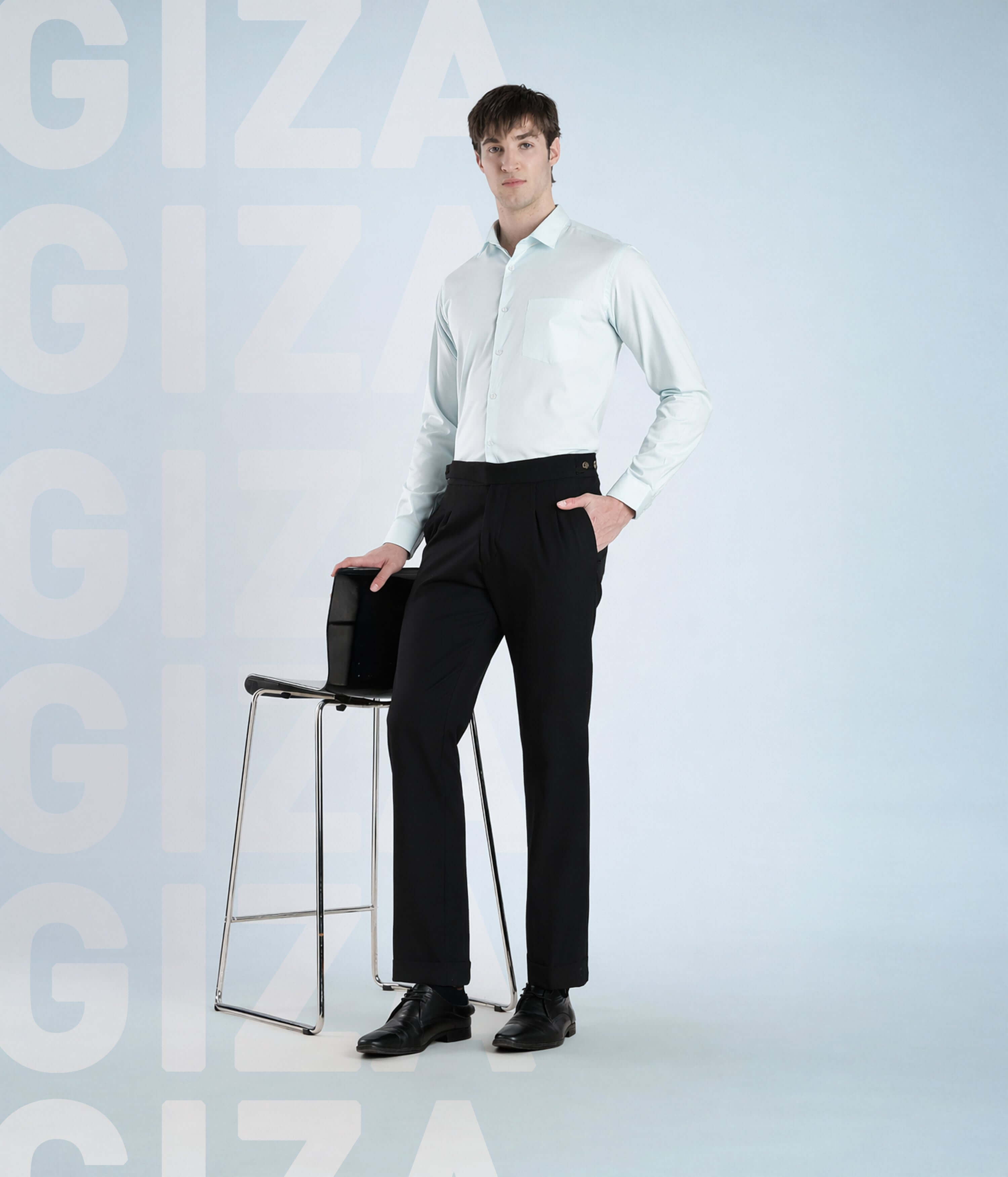 Model wearing Skyblue Luxe Giza cotton shirt with black pants in a stylish pose.