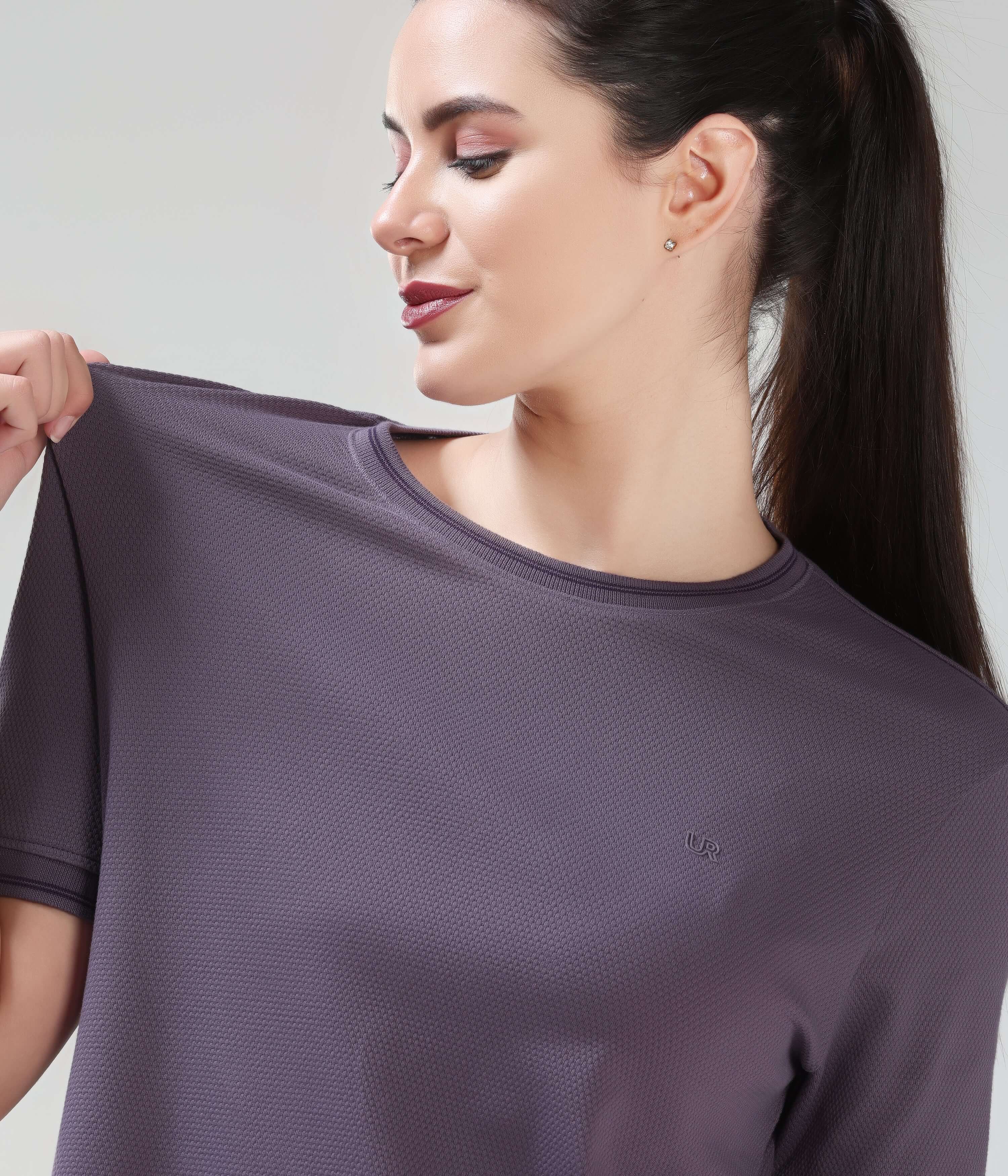 Woman wearing Mulberry Dynasty Cooltech T-shirt in new color from Turms Intelligent Apparel with anti-odour honeycomb fabric and round neckline