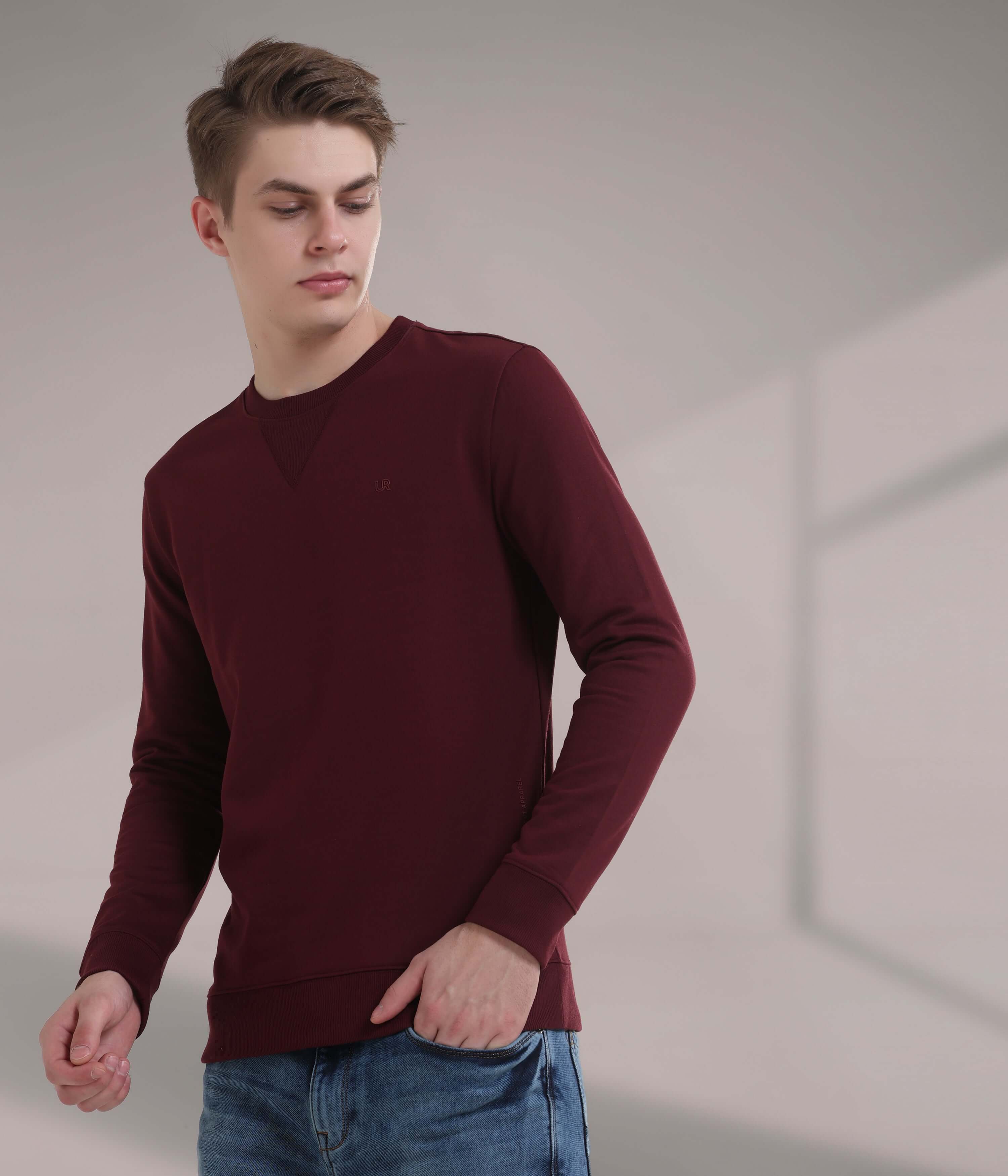 Model wearing a burgundy Turms Intelligent Sweatshirt, showcasing style and comfort for modern menswear.