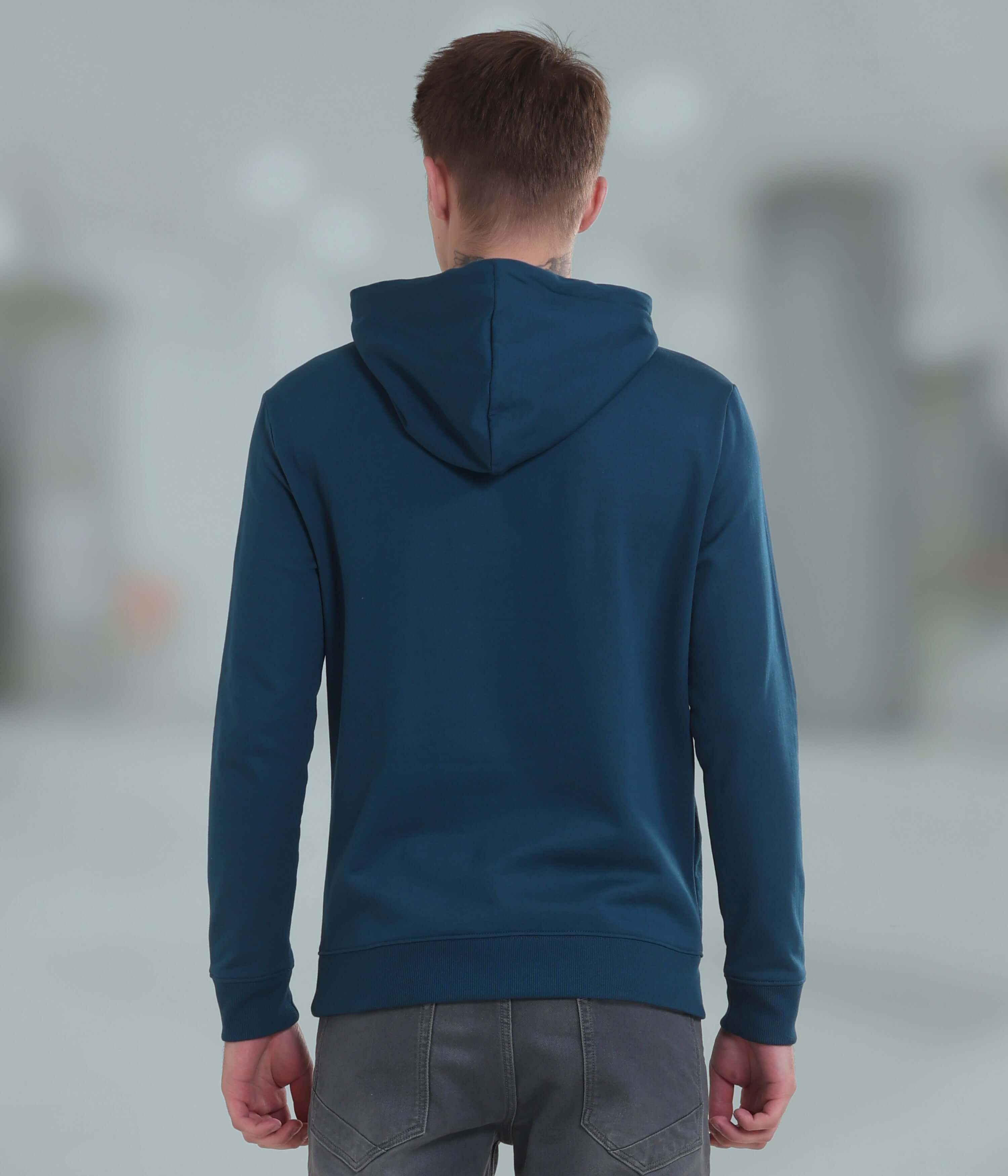 Back view of a man wearing a blue waterproof hoodie, showcasing a stylish and comfortable design for everyday wear.