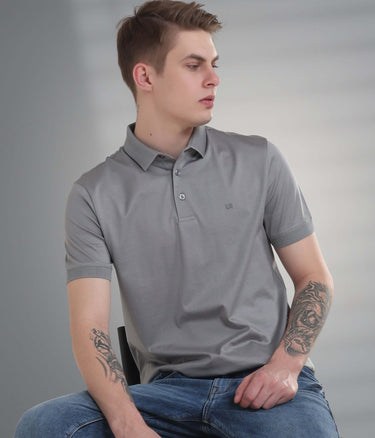 Model wearing Diamond Grey stain-proof polo t-shirt, featuring tailored fit, anti-odor, and waterproof qualities.