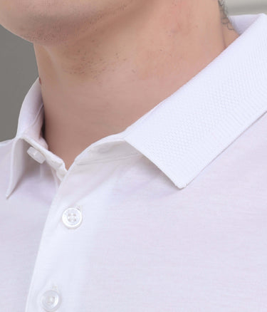 Close-up of white polo shirt collar showcasing stain-proof and odor-resistant fabric in tailored fit design.