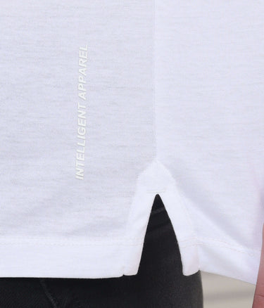 Close-up of white polo t-shirt showing "Intelligent Apparel" logo, highlighting its stylish design and tailored fit.