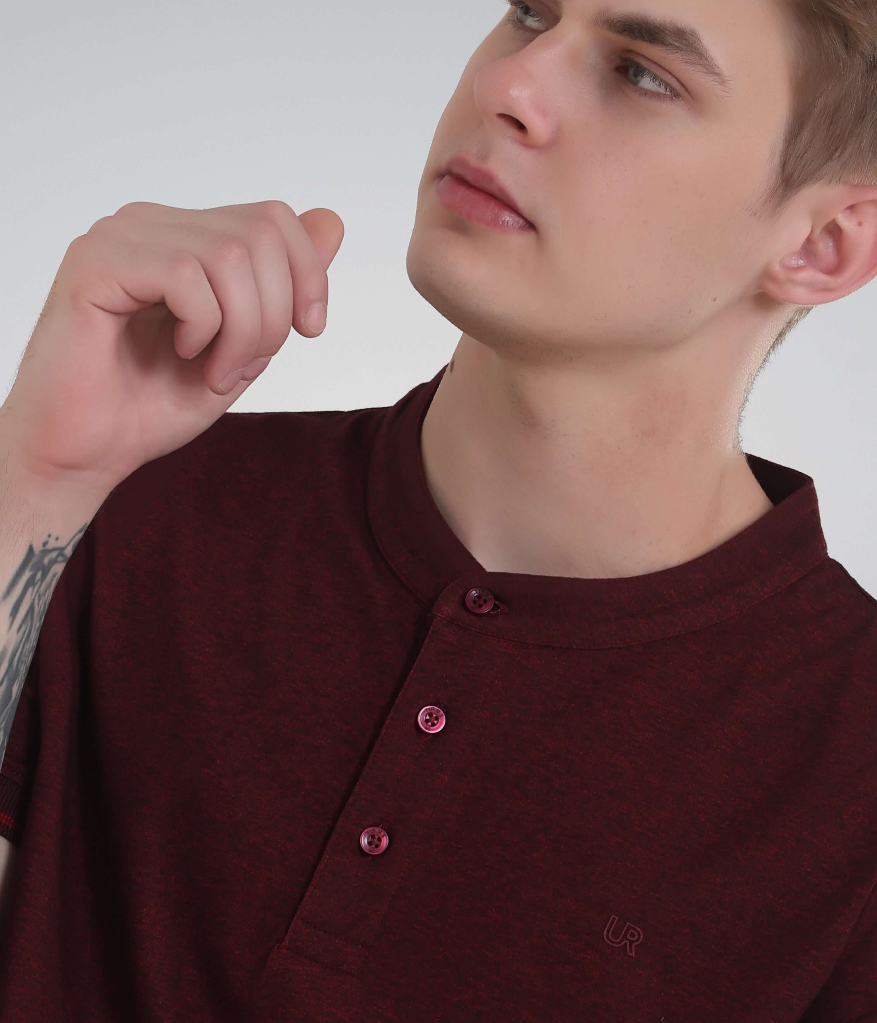 Maroon Turms Intelligent Henley T-Shirt on a model, showcasing collar design and stylish buttons for men’s active wear.