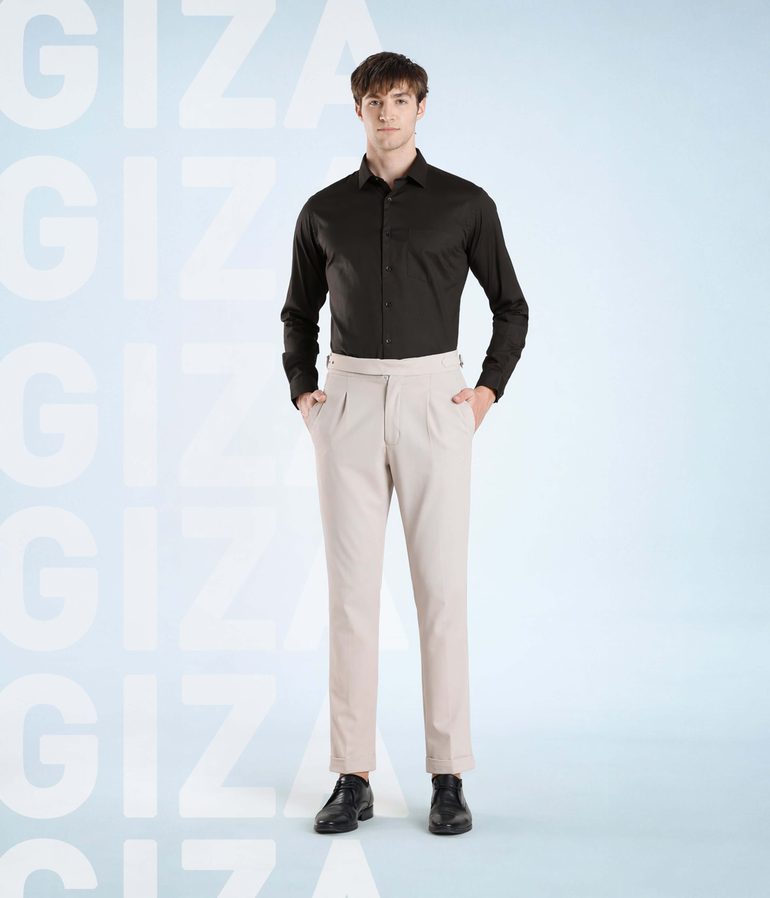 Olive Empire: Model showcasing Giza cotton shirt and trousers, perfect for elegant casual wear.