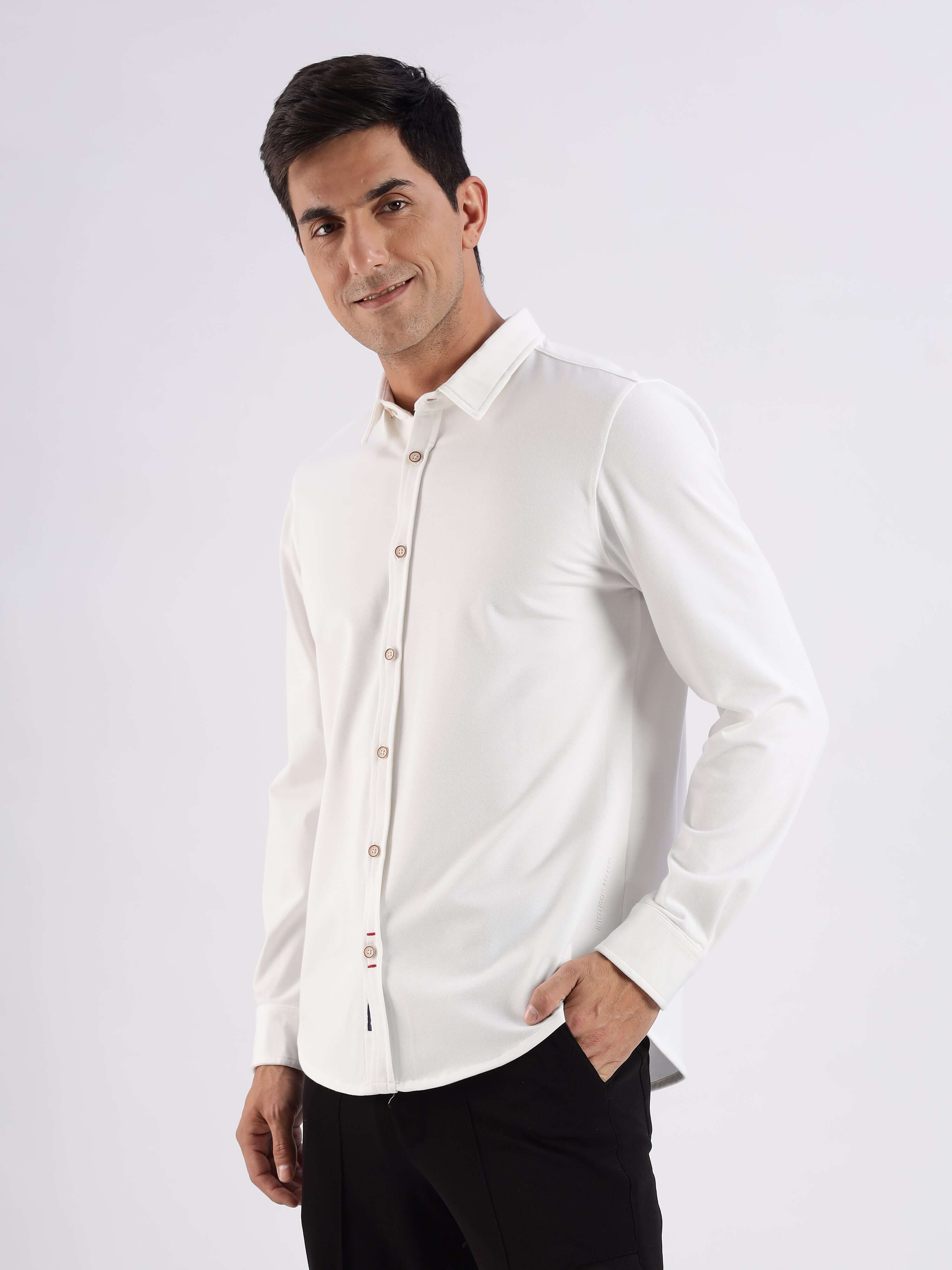 Man wearing a White Willow knitted shirt, showcasing style, comfort, and innovative 8-way stretch functionality.