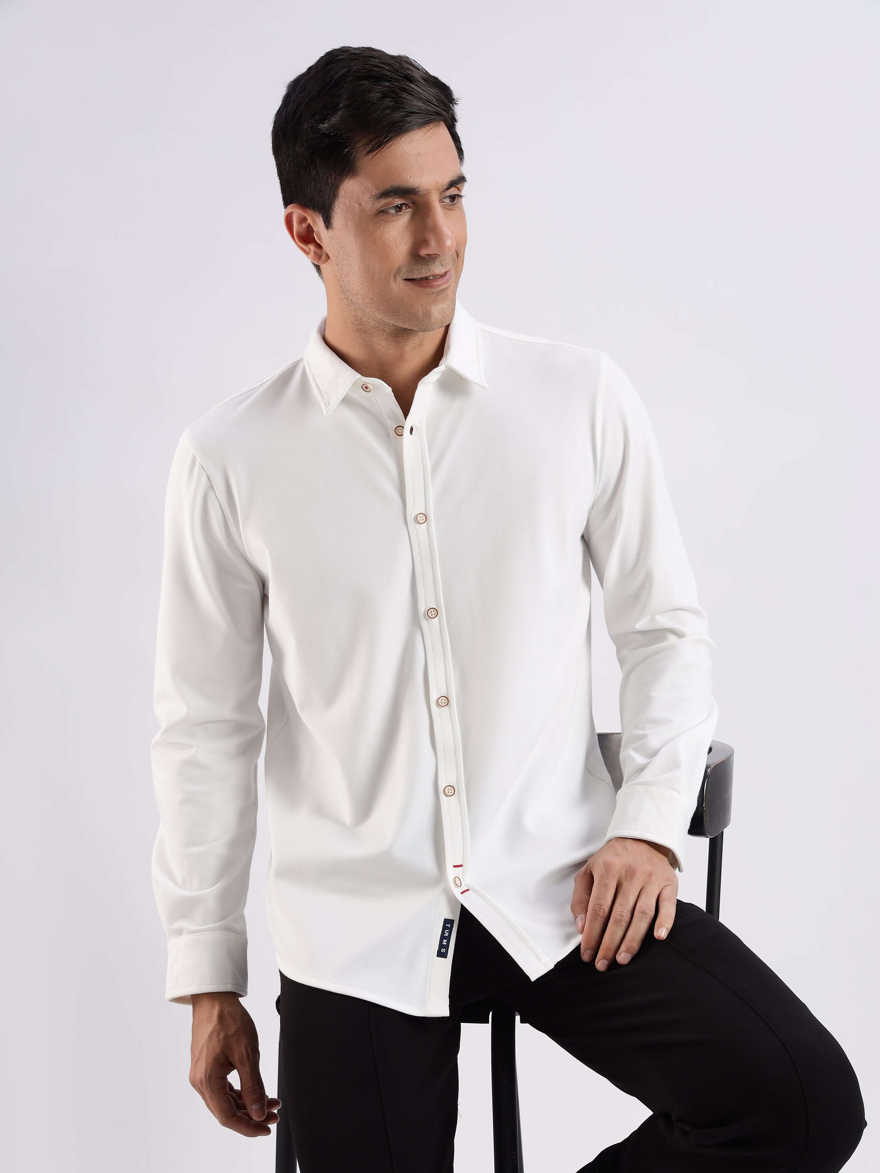 Stylish white knitted shirt with 8-way stretch, anti-odour, and anti-stain features from Turms.