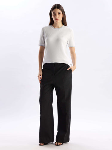 Model wearing Nova Grey Turms Intelligent Ice Cool Tech T-Shirt with comfortable black pants, showcasing style and functionality.