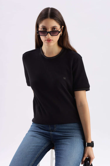 Model wearing Mandalorian Black cooltech tshirt, showcasing comfort and style with UV protection.