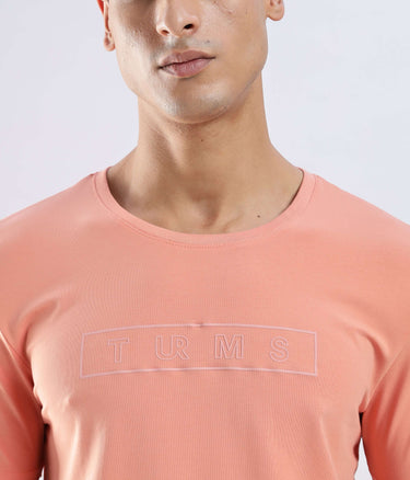 Ember Orange Turms Worry-Free Intelligent T-Shirt showcasing its stretchable, water-proof, anti-odour features in a stylish design.