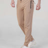 Sahara Beige Turms Intelligent Jogger for men, waterproof, anti-stain, anti-odour, and stretchable design, perfect for travelers.