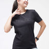 Woman wearing Midnight Elegance black Turms T-shirt with round neck, anti-stain, anti-odour, stretchable, tailored fit, intelligent apparel