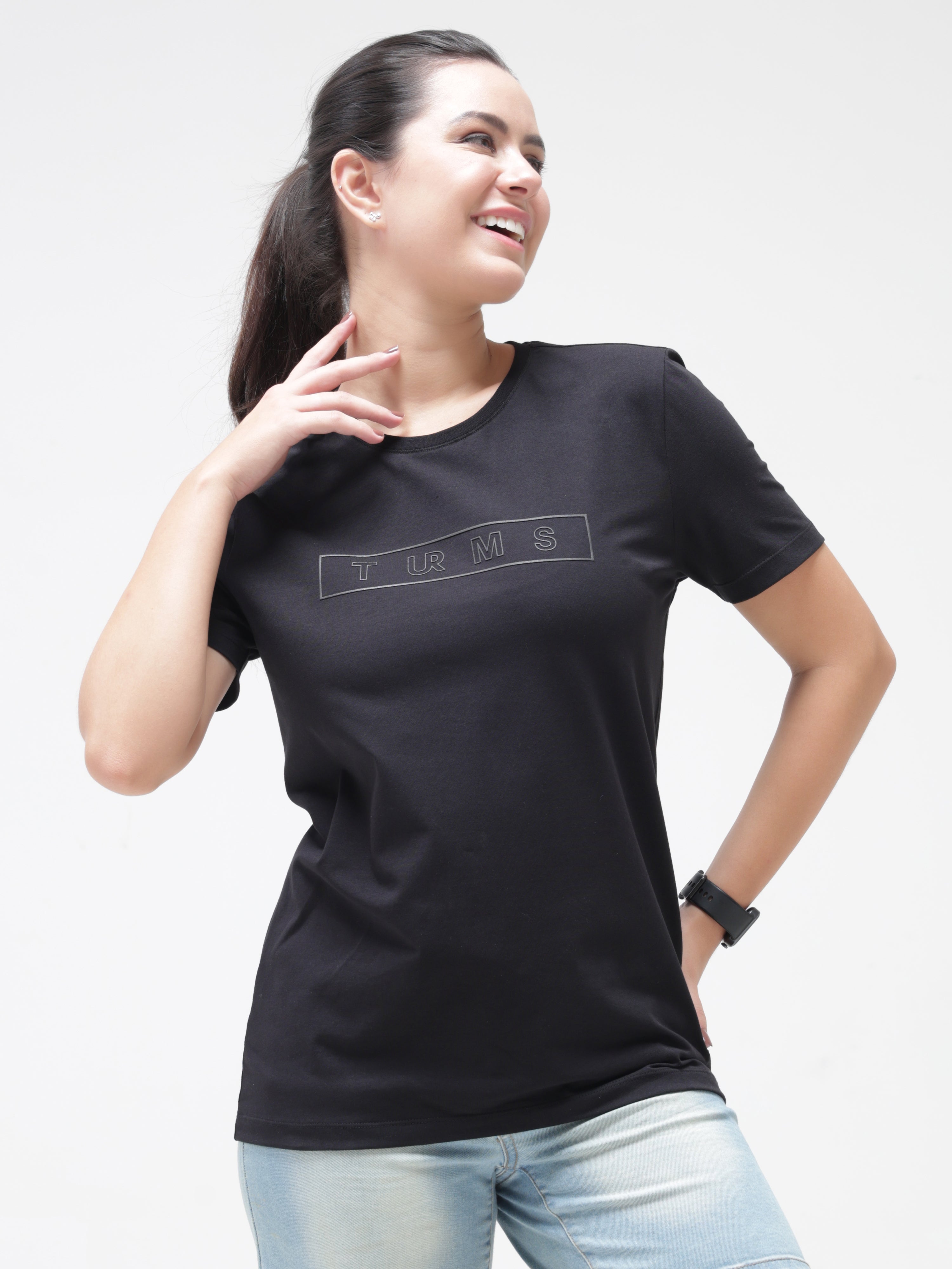 Woman wearing Midnight Elegance black Turms T-shirt with round neck, anti-stain, anti-odour, stretchable, tailored fit, intelligent apparel