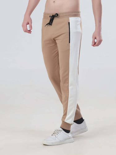 Men's sandy joggers with black drawstring and white side panels, stylish and comfortable, perfect for casual wear.