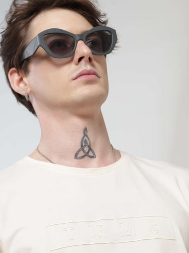 Man wearing Soft Peach Turms T-shirt with crew neck, sunglasses, and showcasing a neck tattoo.
