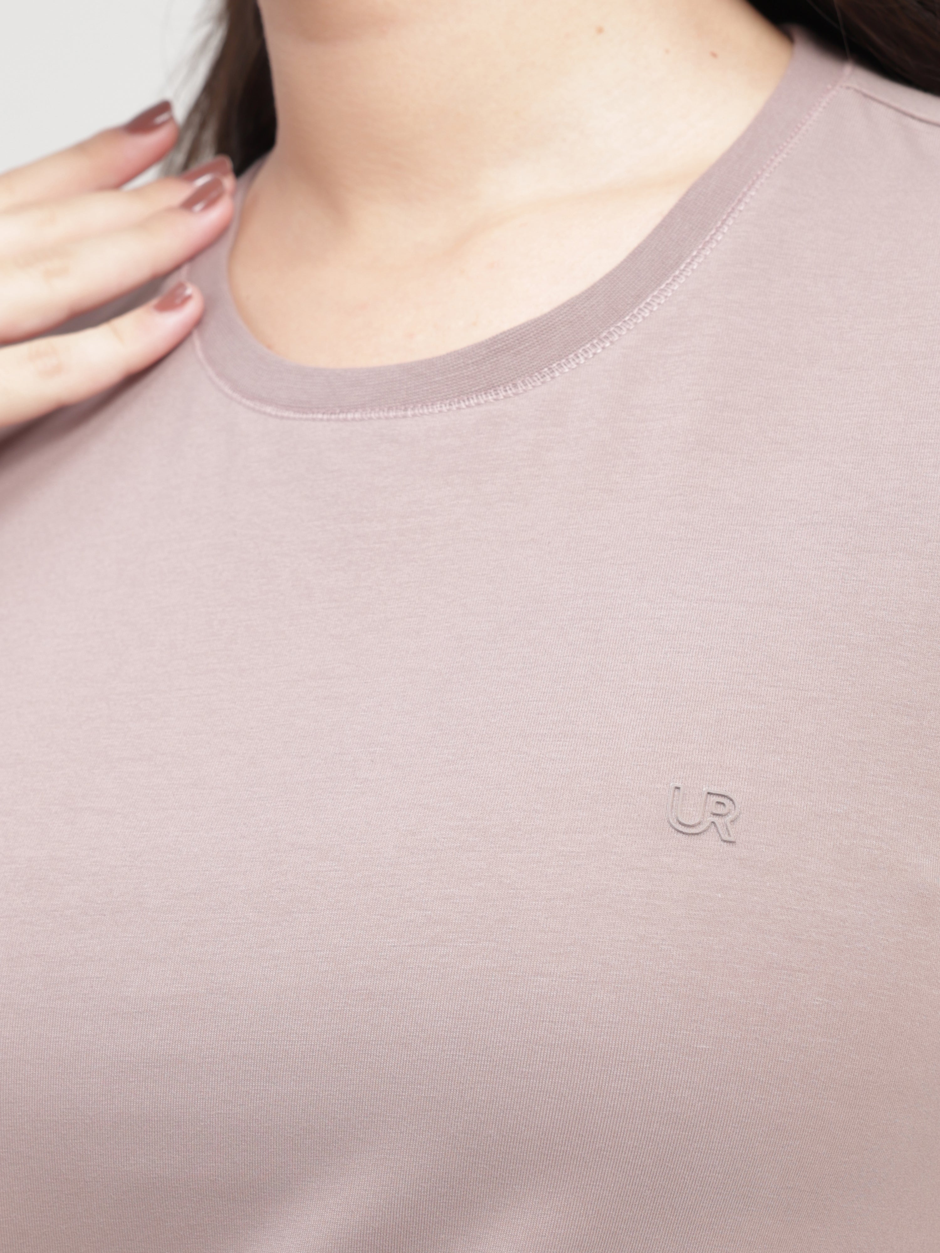 Close-up of Dusky Maroon round-neck Turms T-shirt with tailored fit and anti-stain, anti-odour, and stretchable fabric properties.