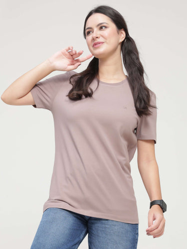 Woman wearing Dusky Maroon Turms T-shirt with anti-stain, anti-odour, and stretchable fabric, showcasing intelligent and trending apparel