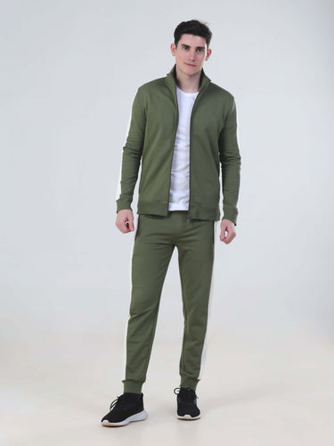 Styled in Turms Intelligent co-ord set, this man showcases a waterproof olive green jacket and joggers for men and women.