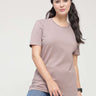 Woman wearing a Dusky Maroon round-neck Turms T-shirt with tailored fit, anti-stain, anti-odour, stretchable fabric, and trending intelligent apparel.