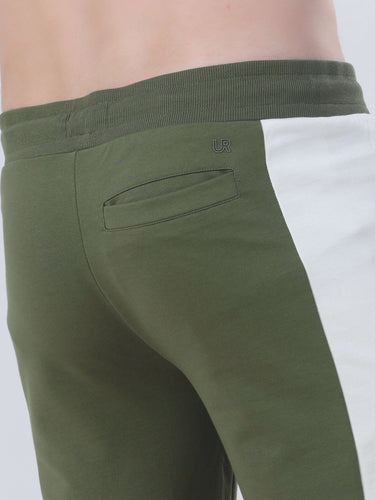 Men's joggers featuring a stylish green and white design with a back pocket detail for convenience.