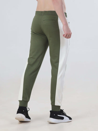 Back view of men’s winter co-ord set joggers in green and white, showcasing durable, water-resistant fabric.
