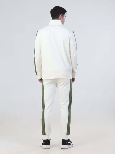 Men's and women's desert snow co-ord set, featuring a stylish white jacket and joggers with green accents.