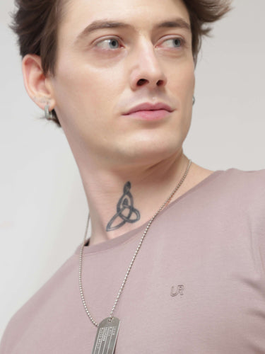 Man wearing a Dusky Maroon round neck stain-proof Turms T-shirt, showcasing stylish and trending mens t-shirts online.