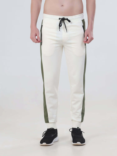 Men's water-resistant joggers in cream with green side stripes, part of Turms Intelligent Co-Ord Set.