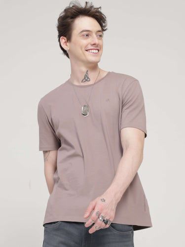 Man wearing Dusky Maroon stain-proof, odor-resistant round neck t-shirt from Turms, tailored fit, stylish and trending tshirts for men.