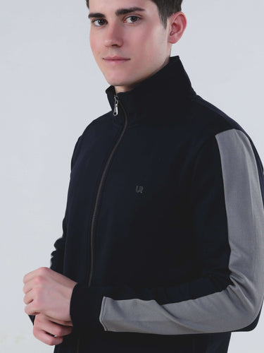 Turms Intelligent co-ord set for men featuring a stylish zip-up jacket with contrast sleeves, crafted from waterproof fabric.