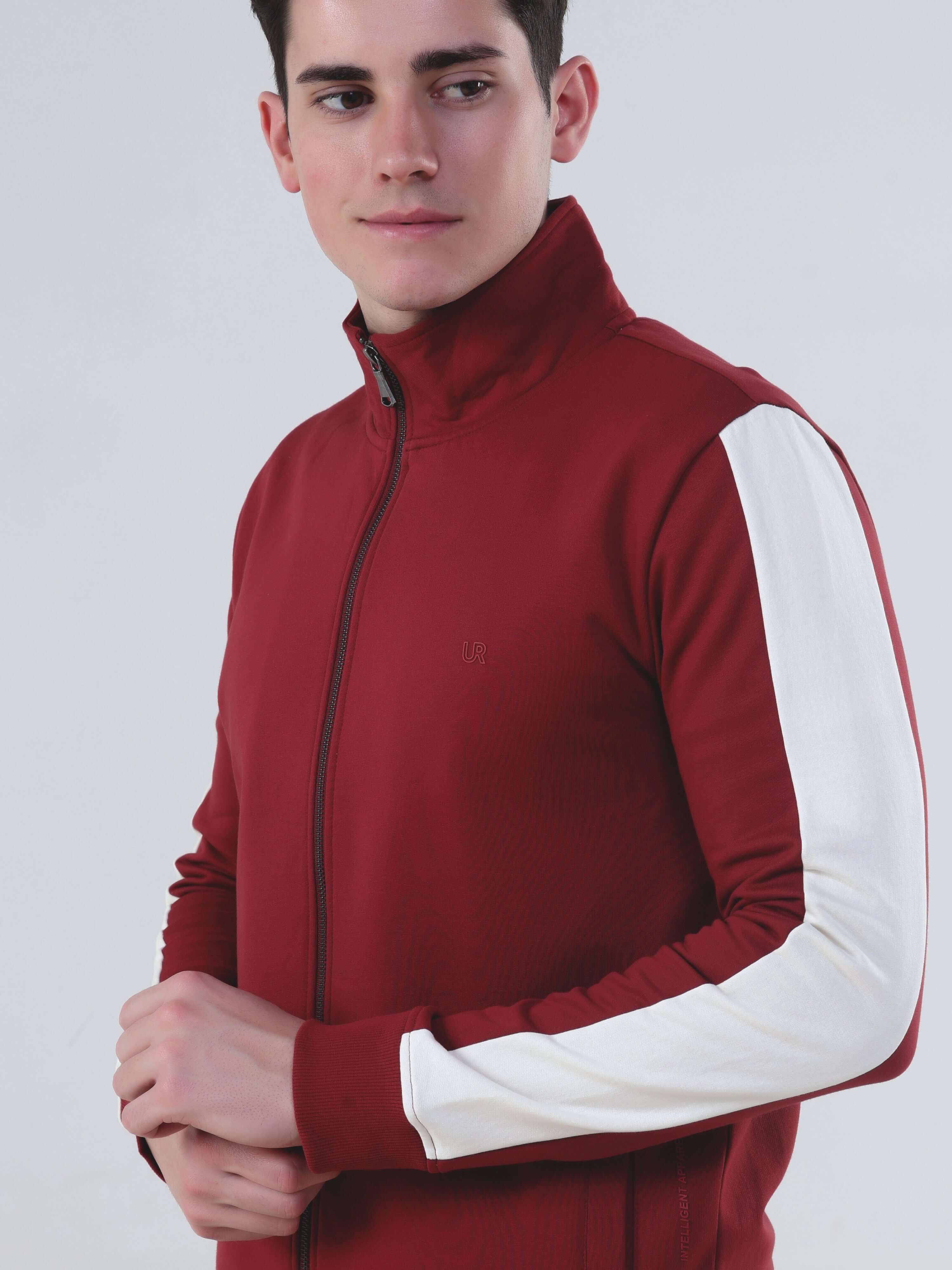 Model wearing Ruby Hunter jacket in wine red with white stripes, showcasing stylish Turms Intelligent apparel.