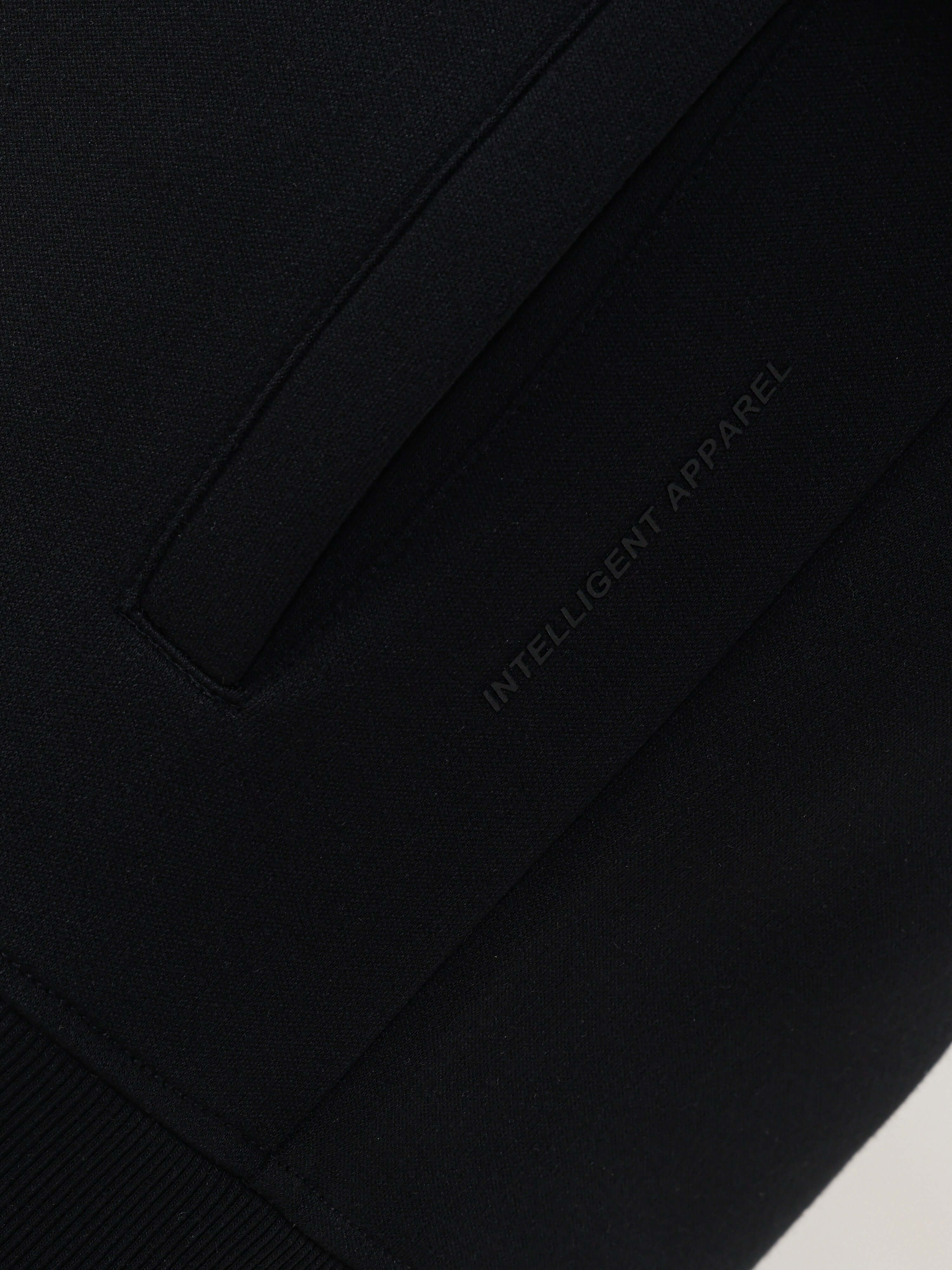 Close-up of Turms Intelligent Traveller Jacket showcasing sleek design and anti-odour, waterproof features.