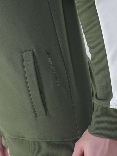 Close-up of Turms Intelligent Co-ord set, featuring olive green fabric and stylish pocket design.
