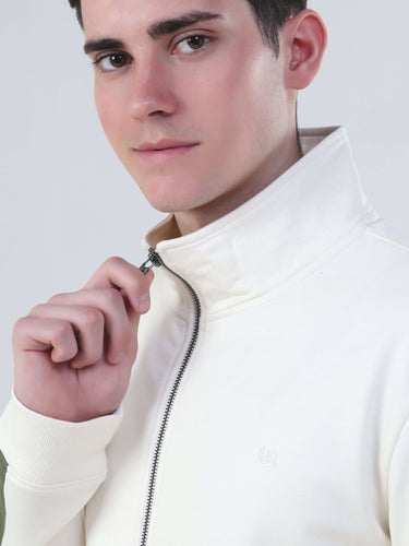 Model wearing a cream Turms Intelligent Cord Set jacket, showcasing stylish design and high-quality fabric.