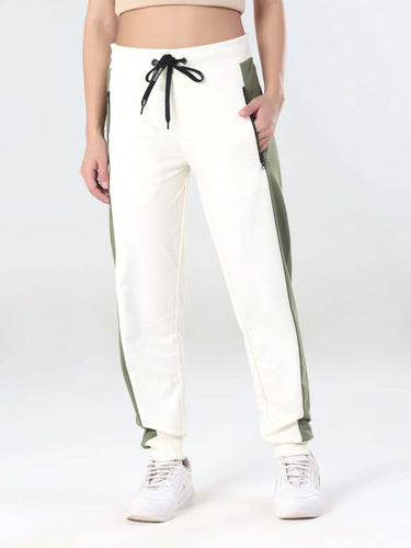 Turms women's joggers in cream and green, featuring anti-stain, waterproof, and anti-odour technology for stylish comfort.