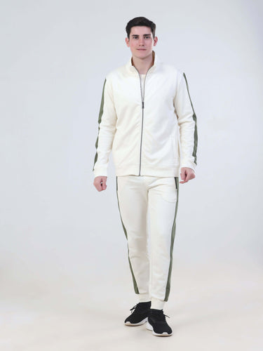Man wearing Turms Intelligent Cord Set in white with green accents, featuring zip jacket and jogger pants, stylish and comfortable.
