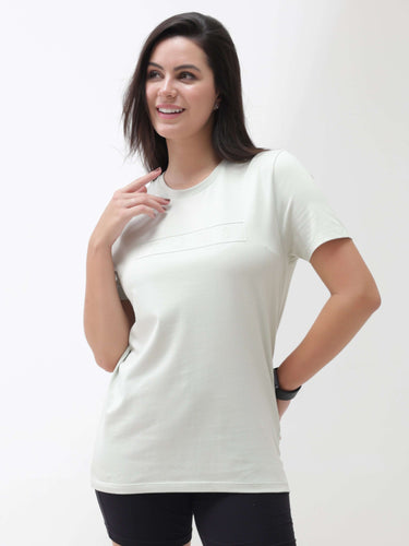 Woman wearing a Lime Enigma Turms T-shirt, anti-stain, anti-odor, stretchable, tailored fit, crew neck, premium cotton, and spandex blend.