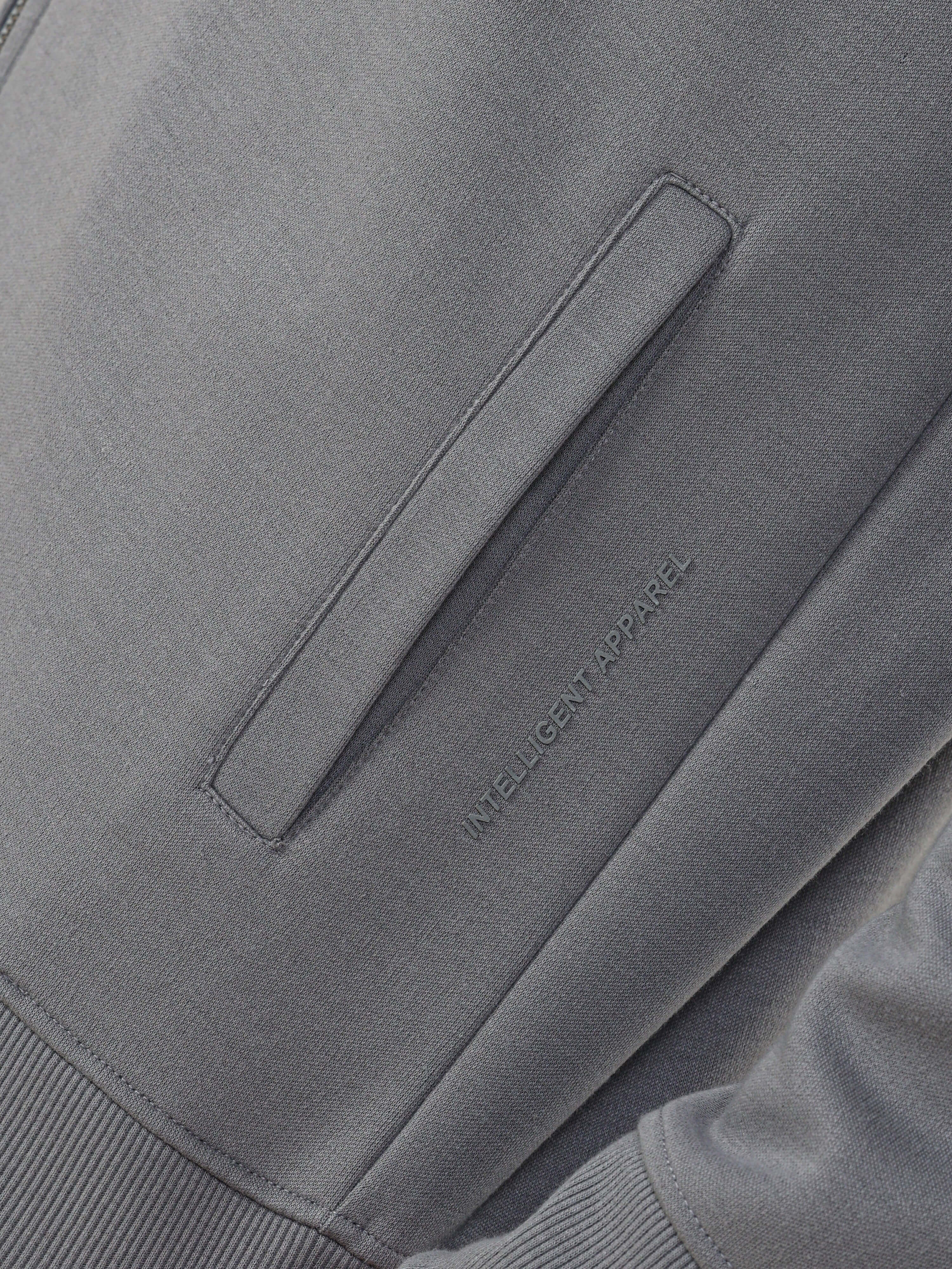 Close-up of the Turms Intelligent Traveller Jacket showcasing its premium fabric and meticulous stitching detail.