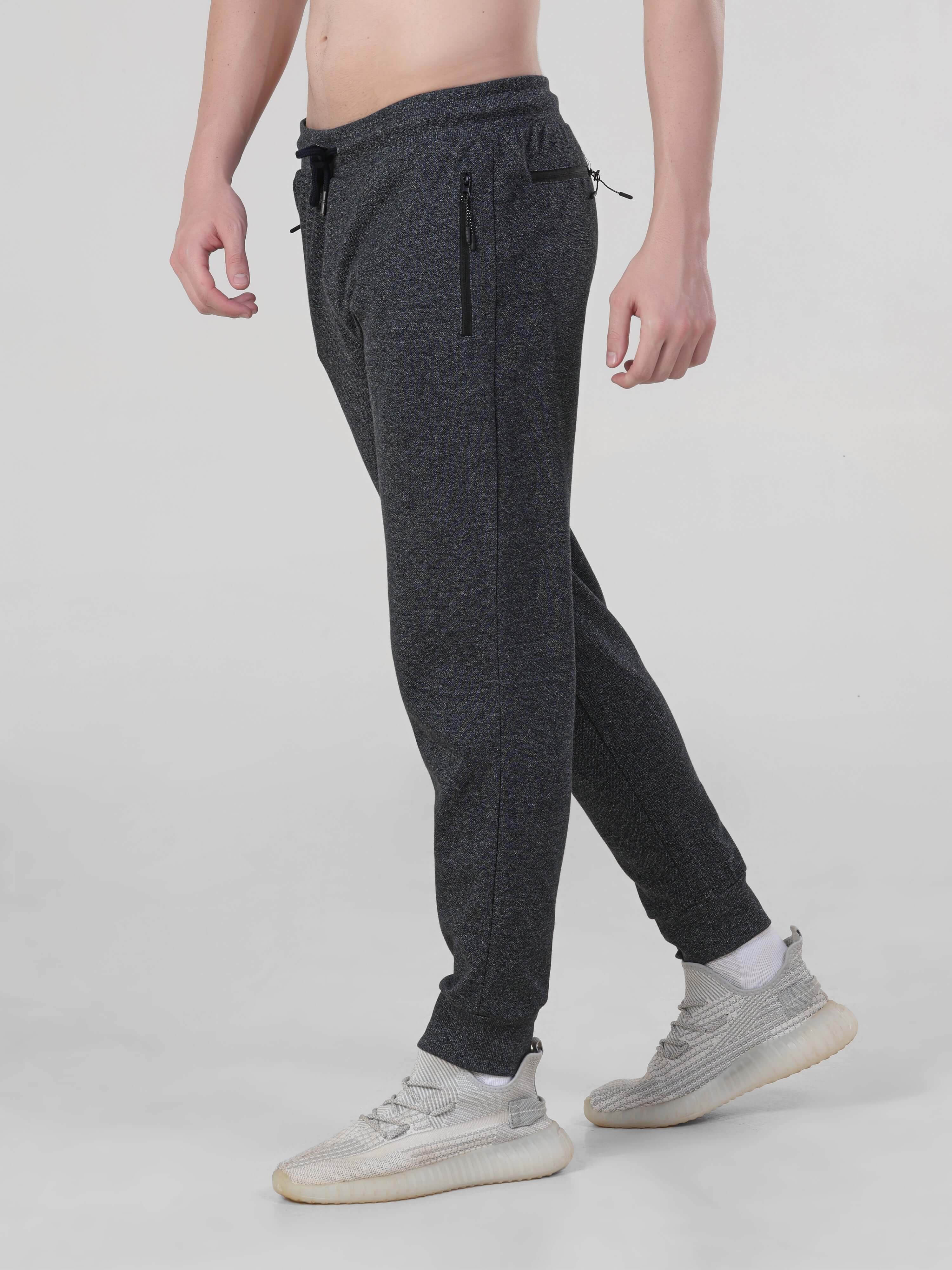 Men's navy joggers from Turms, waterproof, anti-stain, anti-odour, ideal for travelers.