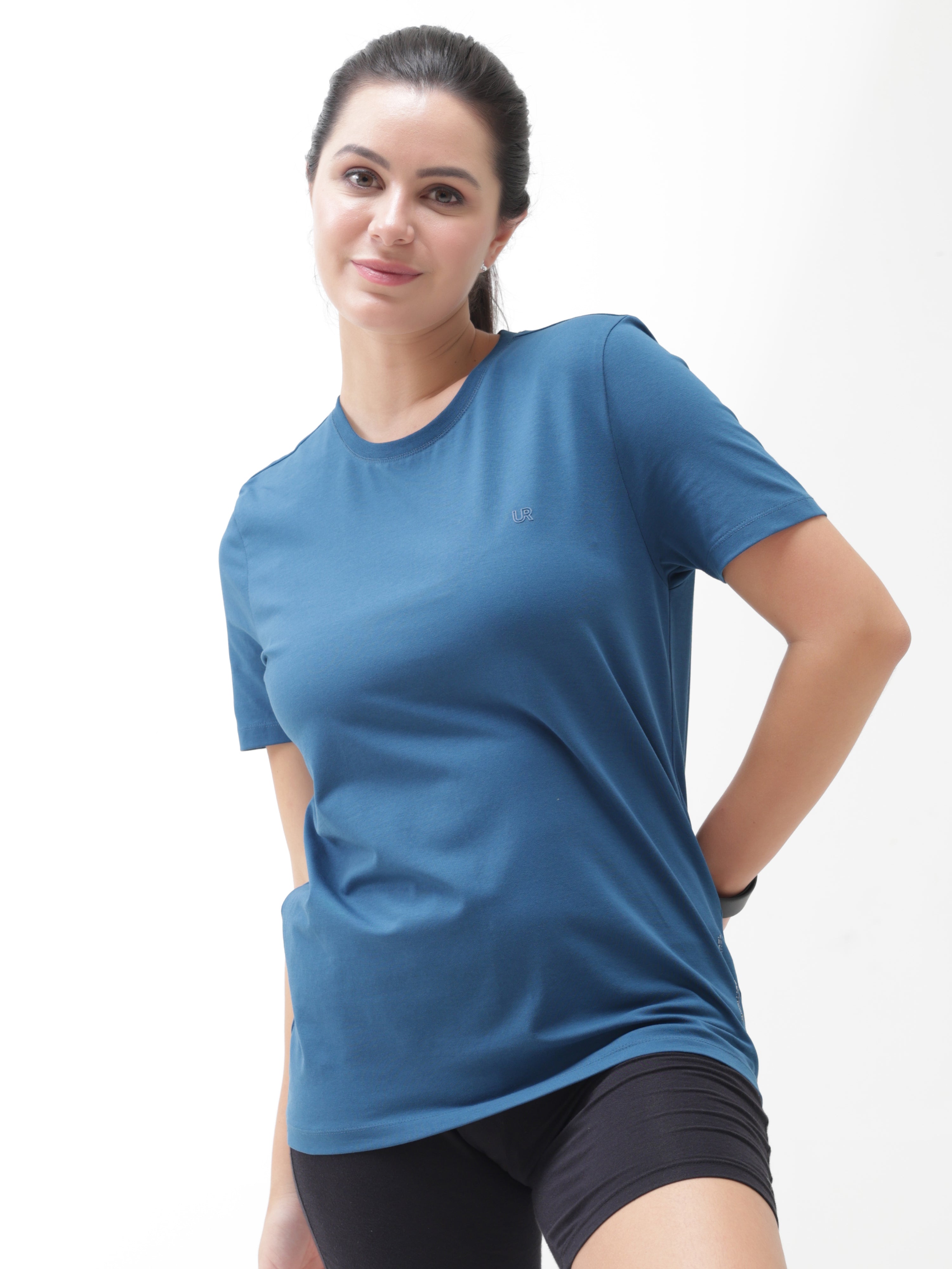 Woman wearing Sea Blue round-neck Turms T-shirt, anti stain, anti odour, stretchable, tailored fit, intelligent apparel trending best.