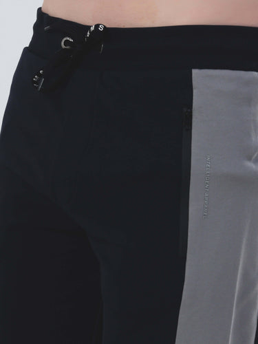 Close-up of water-resistant joggers in black and gray, part of the Turms Intelligent co ord set for men and women.