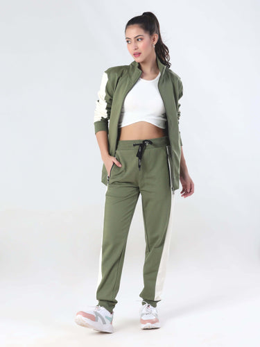 Model wearing the Turms Intelligent coord set in olive green, featuring waterproof joggers and jacket for women.