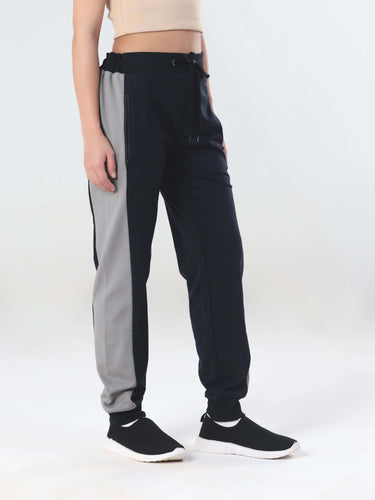 Turms Intelligent women's joggers in navy and gray, featuring anti-stain, waterproof, and anti-odour technology.