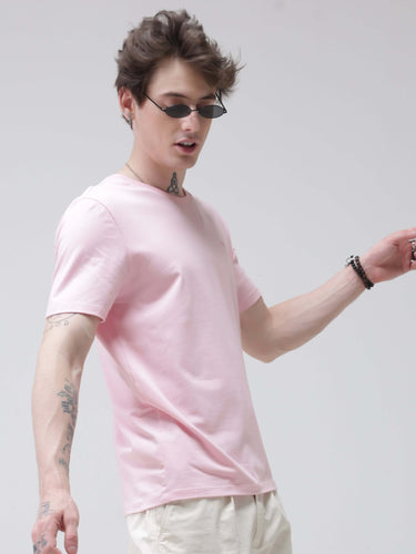 Man wearing pink round-neck Turms T-shirt with anti-stain, anti-odour, and stretchable fabric. Perfect intelligent apparel for trending best tshirts.