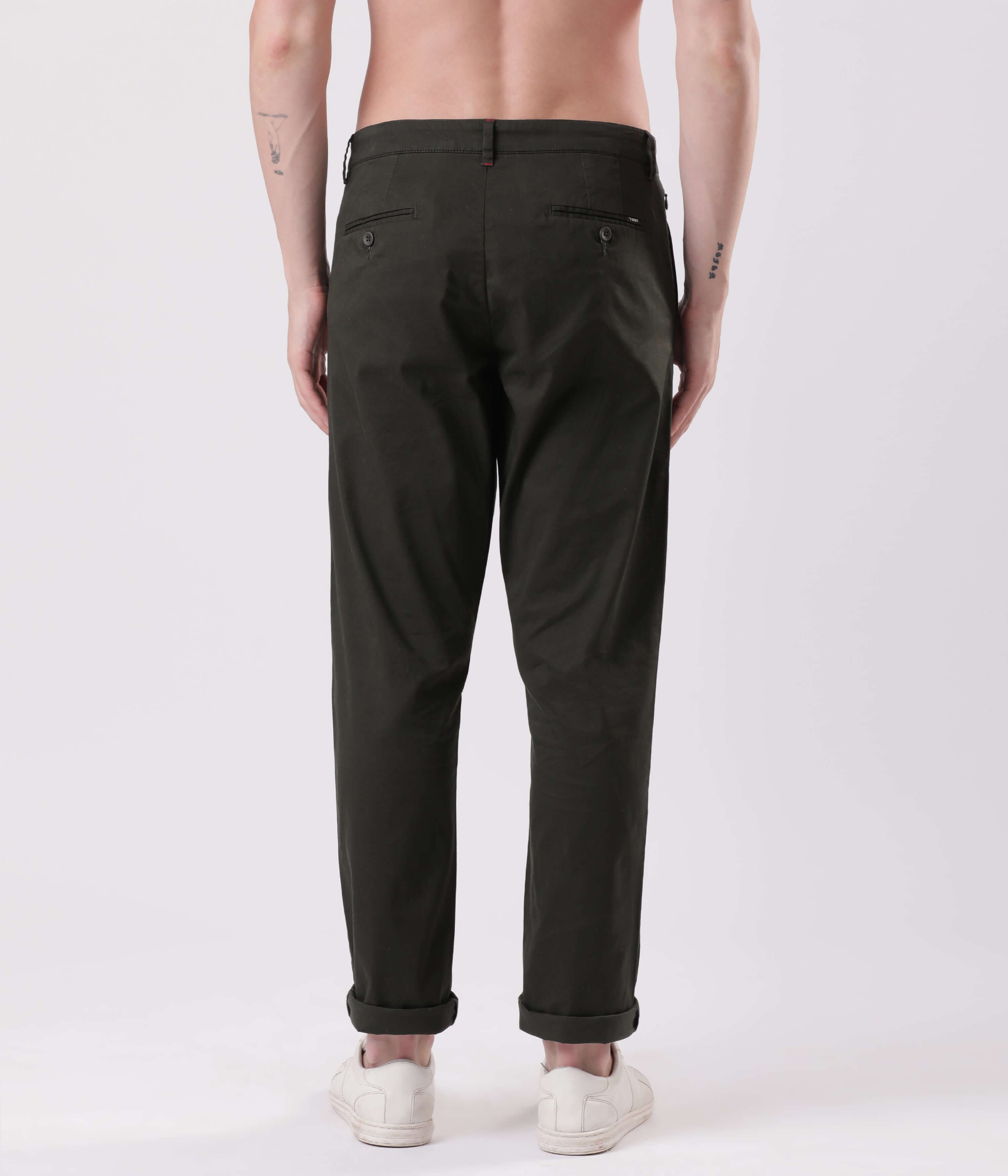 Back view of a man wearing Sage Olive Turms All Day Worry-Less Intelligent Smart flex Chino.