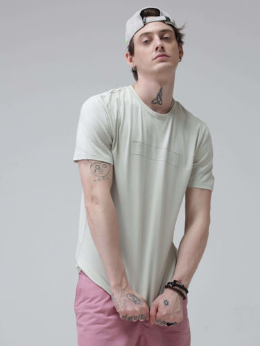 Man wearing Lime Enigma Turms T-shirt with round neck, anti-stain and anti-odour properties, stretchable, tailored fit, intelligent apparel.