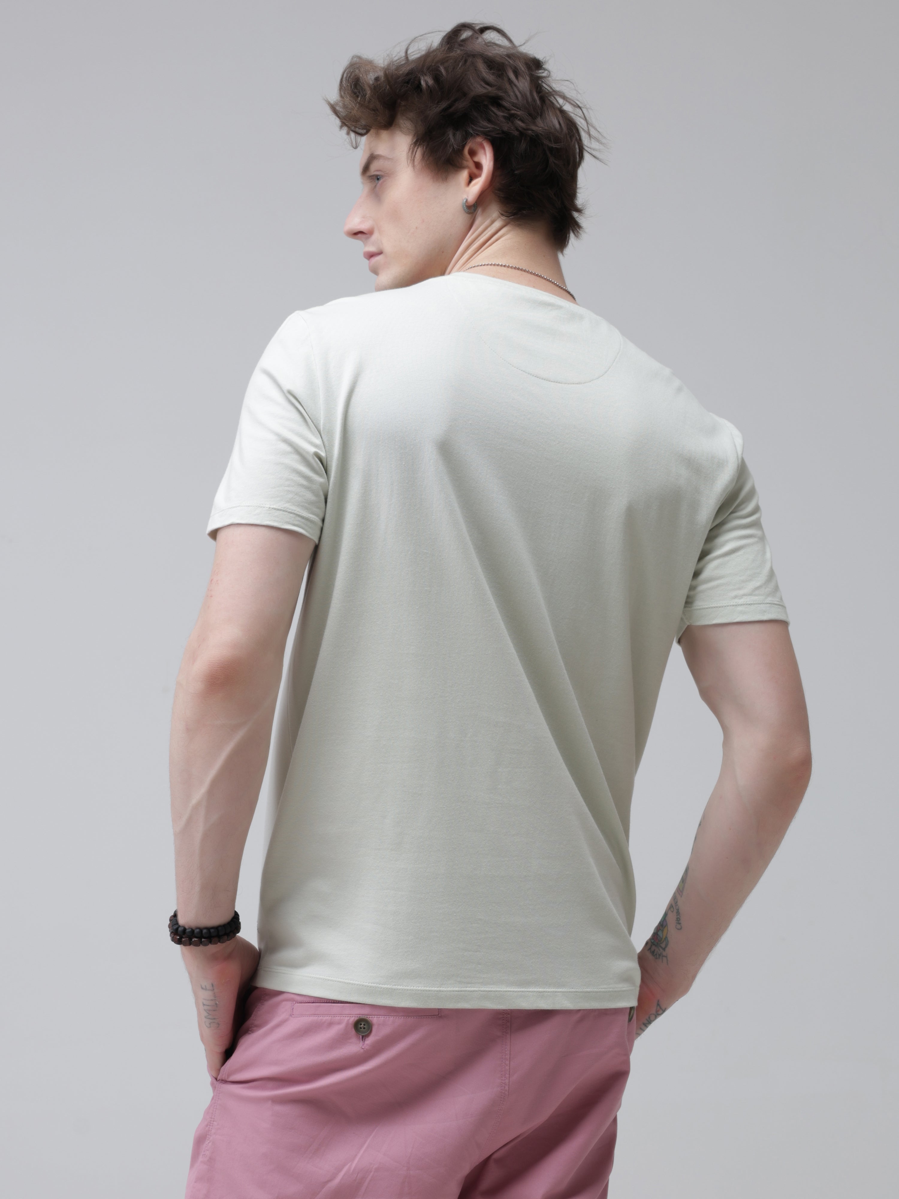 Anti-stain and anti-odor Lime Enigma round-neck Turms T-shirt, tailored fit and stretchable fabric, worn by a man, showcasing the back.