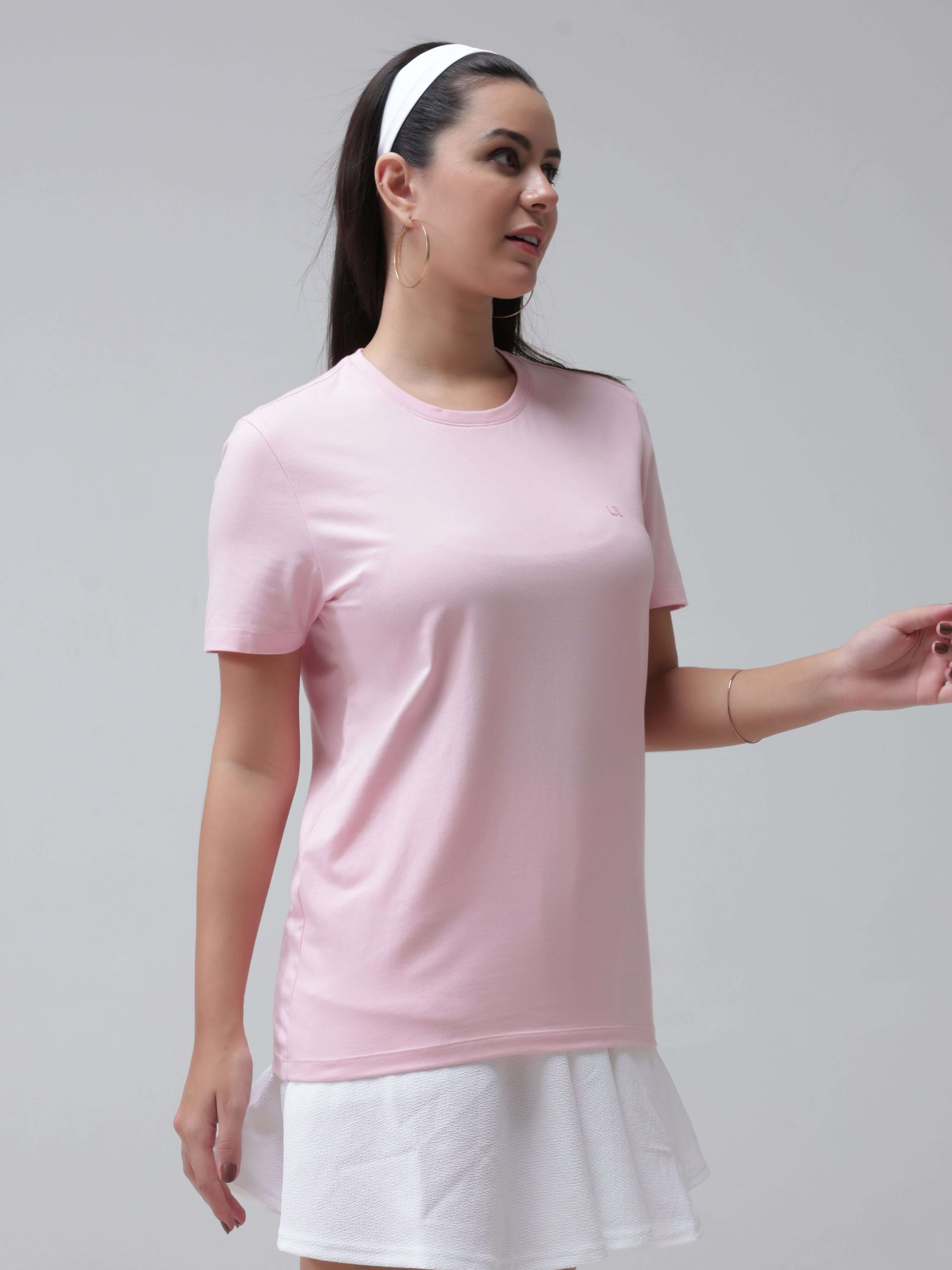 Woman wearing a pink Mystic Orchid Turms T-shirt, anti-stain, anti-odor, stretchable intelligent apparel, tailored fit, trending best women's t-shirts.