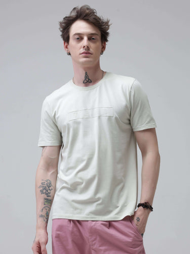 Man wearing Lime Enigma Turms T-shirt with anti-stain and anti-odour features, showcasing stain-proof, stretchable intelligent apparel.