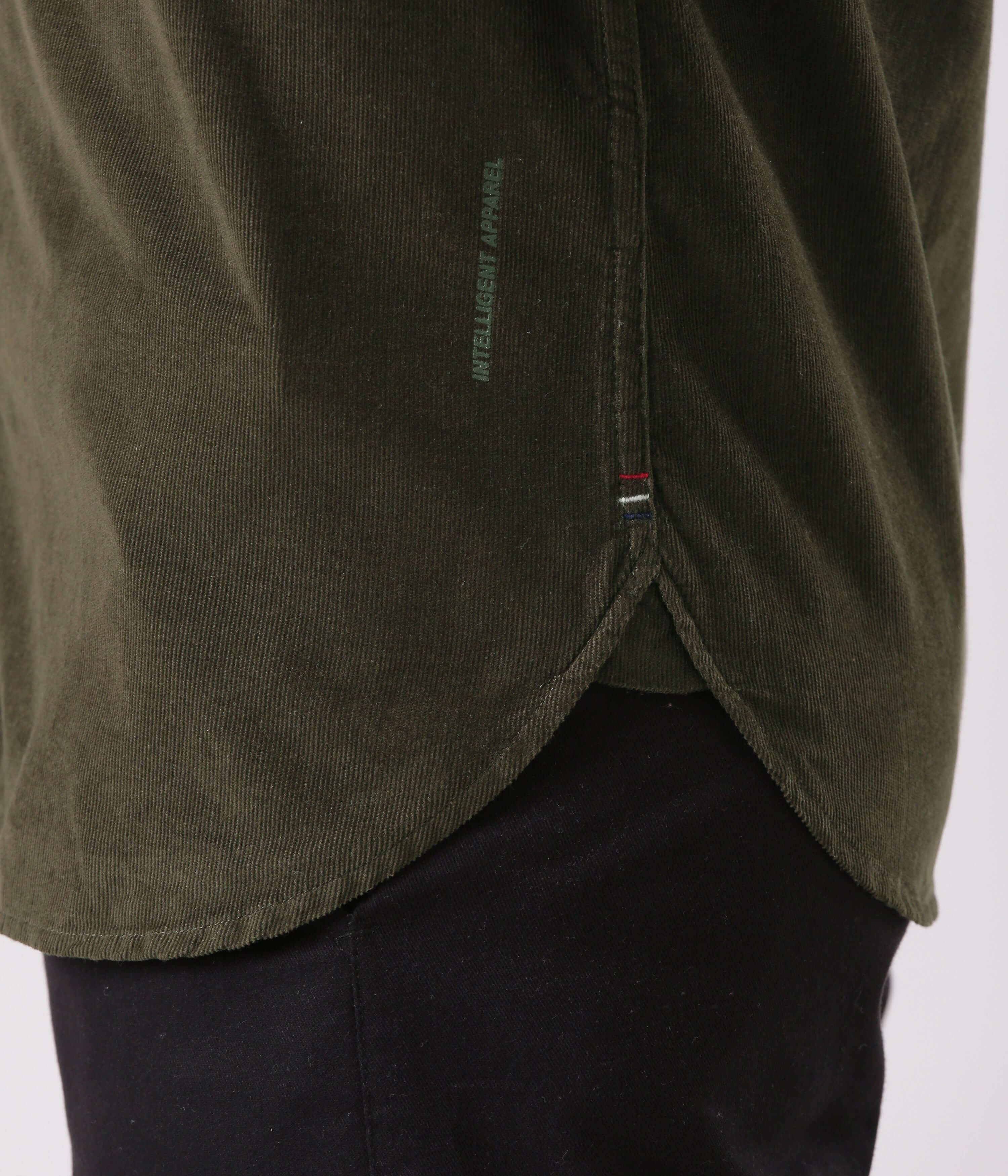 Emerald Star corduroy shirt showcasing side stitching and hem detail from Turms Intelligent Apparel.
